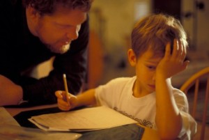 Father Helping Son with Homework